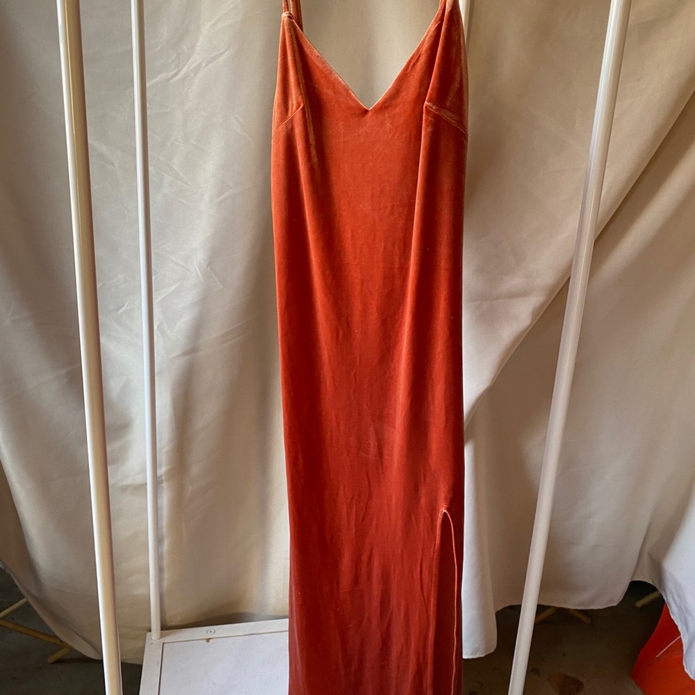 Orange velvet dress.